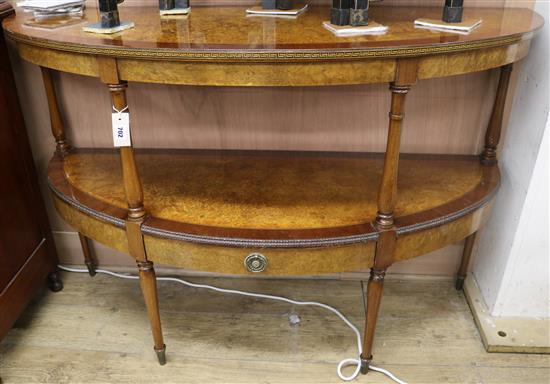 An inlaid burr walnut bowfront two tier side table, W.135cm
